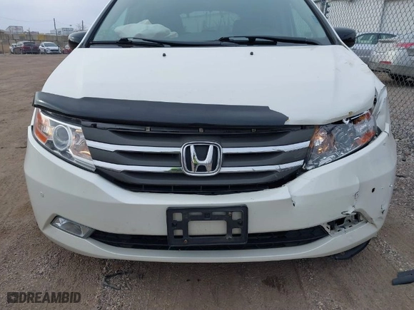 2013 Honda Odyssey Touring with VIN 5FNRL5H96DB089336, listed as a IAAI auction lot 41527990 with 128,770 mi miles. Bid and sale history available at carsss.com. Image 6.
