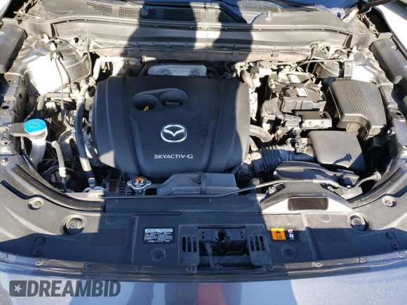 2020 Mazda CX-5 Touring with VIN JM3KFACM7L0846293, listed as a Copart auction lot 83097084 with 68,465 mi miles and Salvage Title. Bid and sale history available at carsss.com. Image 14.