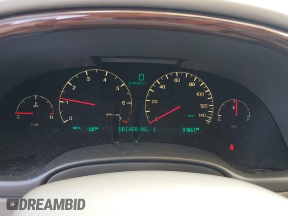 2004 Cadillac DeVille DTS z VIN 1G6KF579X4U212415, wystawiony jako Copart lot #58005555 z przebiegiem 97 663 mil mil oraz Tytuł czysty. Historia ofert i sprzedaży dostępna na DreamBid. Obrazek 9.