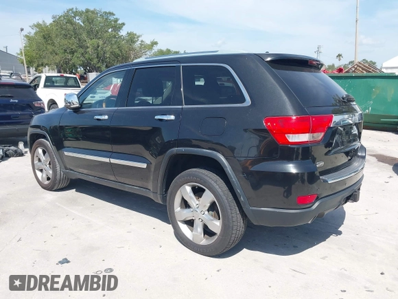 2011 Jeep Grand Cherokee Overland with VIN 1J4RS6GT4BC584029, listed as a IAAI auction lot 42088953 with 144,777 mi miles and . Bid and sale history available at DreamBid. Image 3.
