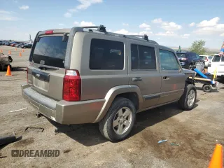 2006 Jeep Commander with VIN 1J8HG48K06C319278, listed as a Copart auction lot 60560225 with 122,920 mi miles and Salvage title. Bid and sale history available at DreamBid. Image 3.