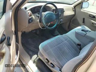 2000 Ford F-150 XL with VIN 1FTZF172XYNB65958, listed as a Copart auction lot 59946145 with 208,988 mi miles and Salvage title. Bid and sale history available at DreamBid. Image 8.