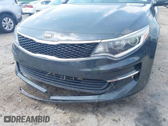2016 Kia Optima LX with VIN 5XXGT4L36GG022483, listed as a IAAI auction lot 42533742 with 98,385 mi miles and . Bid and sale history available at DreamBid. Image 6.