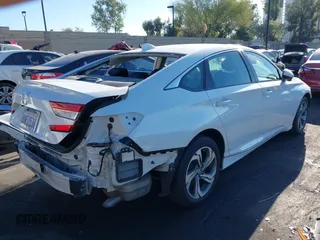 2020 Honda Accord EX with VIN 1HGCV1F4XLA004944, listed as a IAAI auction lot 42582624 with 69,558 mi miles and . Bid and sale history available at DreamBid. Image 4.