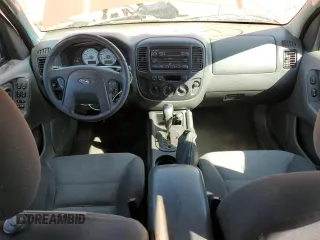 2005 Ford Escape XLS Value with VIN 1FMYU92Z95KA32119, listed as a Copart auction lot 42938255 with 154,499 mi miles and Salvage Title. Bid and sale history available at carsss.com. Image 8.