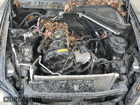 2012 BMW X5 35i z VIN 5UXZV4C5XCL748652, wystawiony jako Copart lot #55457455 z przebiegiem 149 030 mil mil oraz Szkoda całkowita • Salvage title. Historia ofert i sprzedaży dostępna na DreamBid. Obrazek 12.