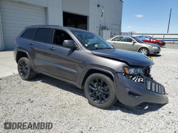 2018 Jeep Grand Cherokee Altitude with VIN 1C4RJFAG5JC320742, listed as a Copart auction lot 56988195 with 140,320 mi miles and Salvage title. Bid and sale history available at DreamBid. Image 4.