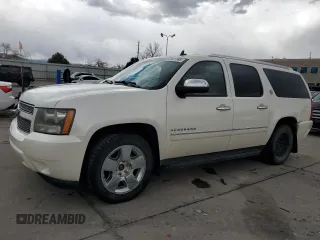 2010 Chevrolet Suburban LTZ with VIN 1GNUKKE35AR292291, listed as a Copart auction lot 49627085 with 233,359 mi miles and Salvage Title. Bid and sale history available at carsss.com. Image 1.