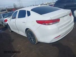 2016 Kia Optima EX with VIN 5XXGU4L39GG041624, listed as a IAAI auction lot 41653133 with 130,312 mi miles. Bid and sale history available at carsss.com. Image 3.