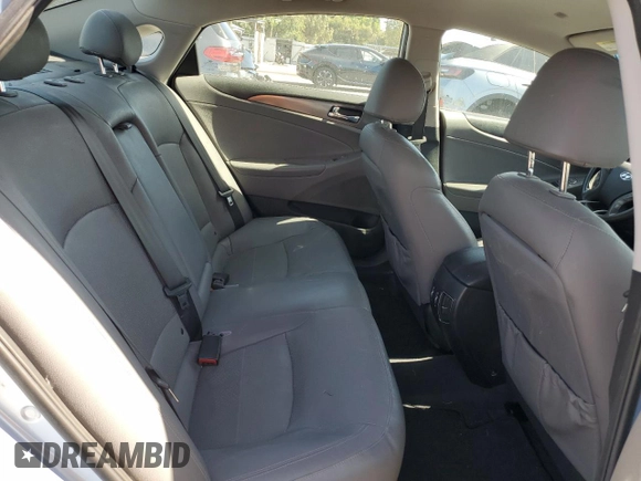 2012 Hyundai Sonata Hybrid z VIN KMHEC4A43CA047569, wystawiony jako Copart lot #57174535 z przebiegiem 186 562 mil mil oraz Czysty tytuł • Clean title. Historia ofert i sprzedaży dostępna na DreamBid. Obrazek 10.