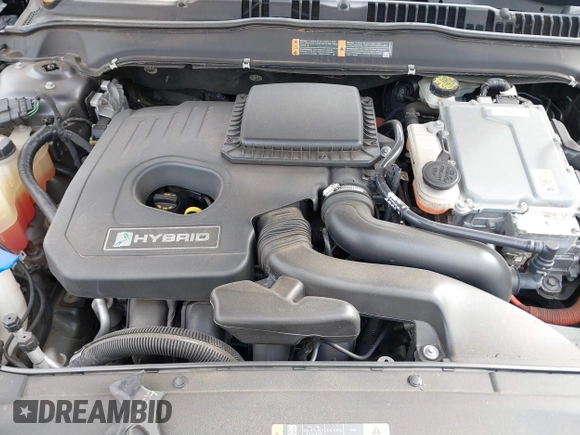 2015 Ford Fusion S Hybrid with VIN 3FA6P0UU7FR167229, listed as a IAAI auction lot 41684934 with 135,317 mi miles. Bid and sale history available at carsss.com. Image 10.