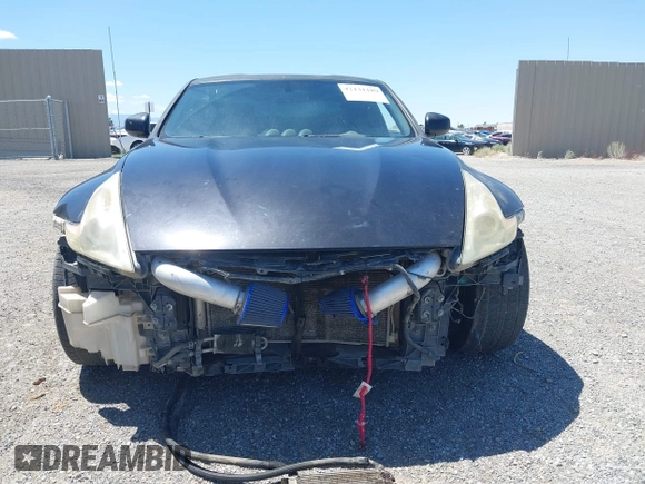 2013 Nissan 370Z z VIN JN1AZ4EH8DM880849, wystawiony jako IAAI lot #42131189 z przebiegiem Nie podano mil oraz . Historia ofert i sprzedaży dostępna na DreamBid. Obrazek 6.