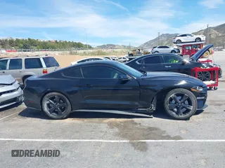2021 Ford Mustang GT z VIN 1FA6P8CF4M5149580, wystawiony jako IAAI lot #41878355 z przebiegiem 60 028 mil mil oraz . Historia ofert i sprzedaży dostępna na DreamBid. Obrazek 13.