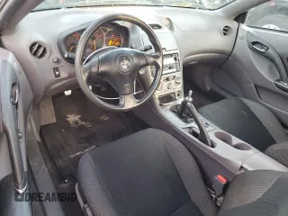 2002 Toyota Celica GT with VIN JTDDR32T720138265, listed as a Copart auction lot 87661215 with 188,822 mi miles and Salvage Title. Bid and sale history available at carsss.com. Image 8.
