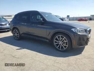 2022 BMW X3 M40i with VIN 5UX83DP06N9J37372, listed as a Copart auction lot 50807105 with 70,070 mi miles and Salvage Title. Bid and sale history available at carsss.com. Image 4.