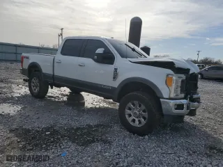 2017 Ford Super Duty F-250 SRW Lariat with VIN 1FT7W2BT3HED06818, listed as a Copart auction lot 45161745 with 166,955 mi miles and Salvage Title. Bid and sale history available at carsss.com. Image 4.