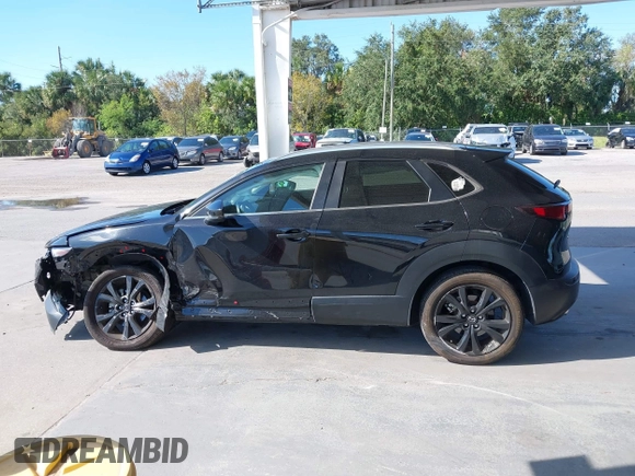2022 Mazda CX-30 2.5 Turbo with VIN 3MVDMBAY3NM440688, listed as a IAAI auction lot 40860258 with 27,445 mi miles and . Bid and sale history available at DreamBid. Image 14.