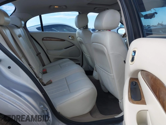 2003 Jaguar S-Type with VIN SAJEA01T83FM48713, listed as a IAAI auction lot 41402152 with 142,875 mi miles and . Bid and sale history available at DreamBid. Image 8.