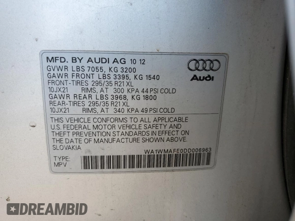 2013 Audi Q7 Prestige with VIN WA1WMAFE0DD006963, listed as a Copart auction lot 59361945 with 169,878 mi miles and Salvage title. Bid and sale history available at DreamBid. Image 13.