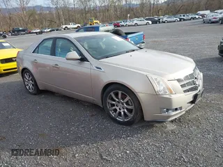 2009 Cadillac CTS AWD w/1SB with VIN 1G6DT57V090154165, listed as a IAAI auction lot 41907798 with 167,874 mi miles. Bid and sale history available at carsss.com. Image 1.