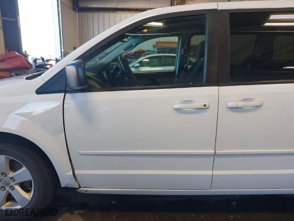 2016 Dodge Grand Caravan Canada Value Package with VIN 2C4RDGBG9GR348877, listed as a IAAI auction lot 41712389 with 110,673 mi miles. Bid and sale history available at carsss.com. Image 14.