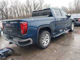 2021 GMC Sierra 1500 SLT z VIN 3GTU9DEL0MG262362, wystawiony jako IAAI lot #41433392 z przebiegiem 69 713 mil mil oraz . Historia ofert i sprzedaży dostępna na DreamBid. Obrazek 4.
