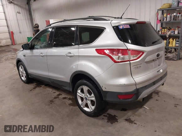 2013 Ford Escape SE with VIN 1FMCU9GX7DUB89197, listed as a IAAI auction lot 42311546 with 131,263 mi miles and . Bid and sale history available at DreamBid. Image 3.