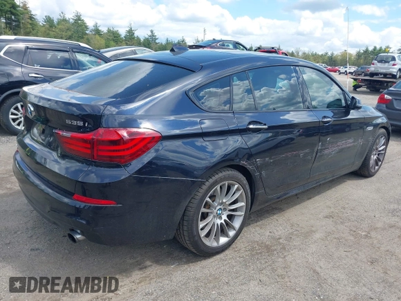 2014 BMW 5 Series 535i Gran Turismo xDrive with VIN WBA5M4C52ED183844, listed as a IAAI auction lot 42227214 with 104,098 mi miles and . Bid and sale history available at DreamBid. Image 4.