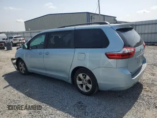 2015 Toyota Sienna LE AAS with VIN 5TDKK3DC9FS609084, listed as a Copart auction lot 57055295 with 247,531 mi miles and Salvage title. Bid and sale history available at DreamBid. Image 2.