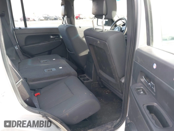 2012 Jeep Liberty Sport with VIN 1C4PJMAKXCW133658, listed as a IAAI auction lot 41814977 with 128,328 mi miles and . Bid and sale history available at carsss.com. Image 8.