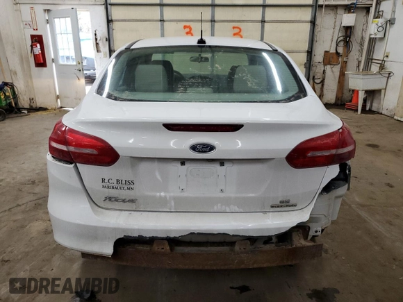 2015 Ford Focus SE z VIN 1FADP3F20FL241951, wystawiony jako Copart lot #89021775 z przebiegiem 91 698 mil mil oraz Szkoda całkowita • Salvage title. Historia ofert i sprzedaży dostępna na DreamBid. Obrazek 6.