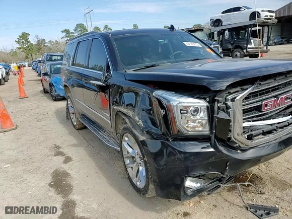 2017 GMC Yukon SLT with VIN 1GKS1BKC1HR112097, listed as a Copart auction lot 44185415 with 140628 miles and Salvage Title. Bid and sale history available at carsss.com. Image 14.