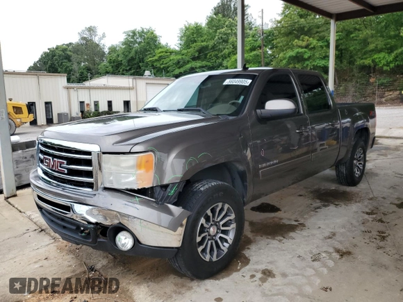 2012 GMC Sierra 1500 SLT with VIN 3GTP2WE74CG310914, listed as a Copart auction lot 56049905 with 106,882 mi miles and Salvage title. Bid and sale history available at DreamBid. Image 1.