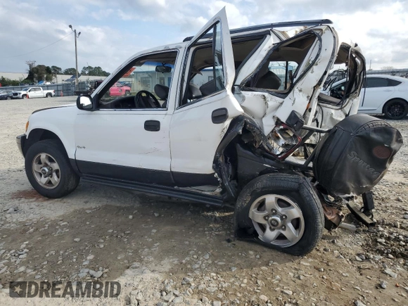 1999 Kia Sportage with VIN KNDJA7233X5600719, listed as a Copart auction lot 80529384 with 56,657 mi miles and Salvage Title. Bid and sale history available at carsss.com. Image 2.