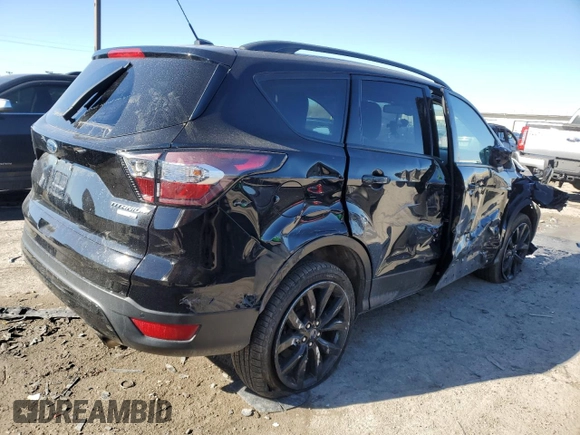 2017 Ford Escape Titanium with VIN 1FMCU9JD0HUC74354, listed as a Copart auction lot 42356345 with 184,816 mi miles and Salvage Title. Bid and sale history available at carsss.com. Image 3.
