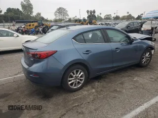 2014 Mazda 3 i Grand Touring with VIN JM1BM1W77E1172938, listed as a Copart auction lot 53194585 with 106,654 mi miles and Salvage Title. Bid and sale history available at DreamBid. Image 3.