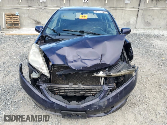 2009 Honda Fit Sport z VIN JHMGE88409S052668, wystawiony jako Copart lot #56142275 z przebiegiem 118 445 mil mil oraz Szkoda całkowita • Salvage title. Historia ofert i sprzedaży dostępna na DreamBid. Obrazek 5.