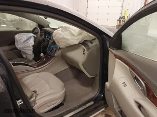 2012 Buick LaCrosse Leather with VIN 1G4GC5E39CF345157, listed as a IAAI auction lot 41282070 with 114,461 mi miles. Bid and sale history available at carsss.com. Image 5.