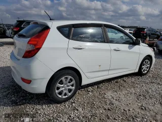 2014 Hyundai Accent GS with VIN KMHCT5AE1EU145619, listed as a Copart auction lot 43746195 with 121,357 mi miles and Salvage Title. Bid and sale history available at carsss.com. Image 3.