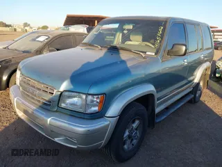 2002 Isuzu Trooper S with VIN JACDJ58X227J09839, listed as a IAAI auction lot 41657602 with 211,237 mi miles and . Bid and sale history available at DreamBid. Image 2.