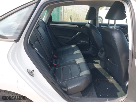 2015 Volkswagen Passat 1.8T Wolfsburg Ed with VIN 1VWAT7A39FC006249, listed as a IAAI auction lot 40204853 with 137,392 mi miles. Bid and sale history available at carsss.com. Image 8.