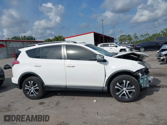 2017 Toyota RAV4 LE with VIN JTMZFREV3HJ143416, listed as a IAAI auction lot 41861981 with 115,241 mi miles and . Bid and sale history available at DreamBid. Image 13.