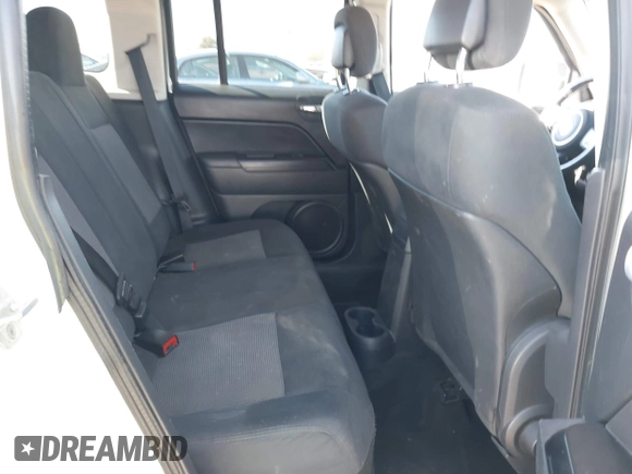 2011 Jeep Patriot Latitude with VIN 1J4NT1GB0BD105816, listed as a IAAI auction lot 41330180 with 143,431 mi miles. Bid and sale history available at carsss.com. Image 8.