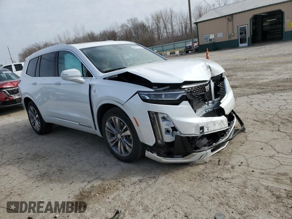2022 Cadillac XT6 Premium Luxury with VIN 1GYKPFRS1NZ149557, listed as a Copart auction lot 49612165 with 31,425 mi miles and Salvage Title. Bid and sale history available at carsss.com. Image 4.