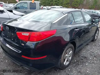 2015 Kia Optima LX with VIN 5XXGM4A75FG465435, listed as a IAAI auction lot 41738703 with 196,915 mi miles. Bid and sale history available at carsss.com. Image 4.