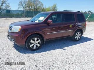 2012 Honda Pilot Touring with VIN 5FNYF4H90CB020623, listed as a IAAI auction lot 42048740 with 162,504 mi miles. Bid and sale history available at carsss.com. Image 2.