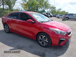 2019 Kia Forte LXS z VIN 3KPF24AD9KE014180, wystawiony jako IAAI lot #42093829 z przebiegiem 67 402 mil mil oraz . Historia ofert i sprzedaży dostępna na DreamBid. Obrazek 1.