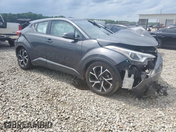 2018 Toyota C-HR XLE z VIN NMTKHMBX7JR004515, wystawiony jako Copart lot #57106385 z przebiegiem Nie podano mil oraz Szkoda całkowita • Salvage title. Historia ofert i sprzedaży dostępna na DreamBid. Obrazek 4.