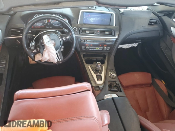 2013 BMW M6 с VIN WBSLZ9C59DDZ77823, выставлен на аукционе Copart как лот 62354225 с пробегом 74 704 миль миль и Списание • Salvage title. История ставок и продаж доступна на DreamBid. Изображение 8.