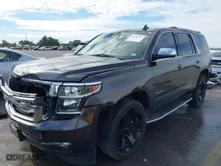 2015 Chevrolet Tahoe LTZ with VIN 1GNSCCKC8FR617540, listed as a IAAI auction lot 41356342 with 118,268 mi miles. Bid and sale history available at carsss.com. Image 2.